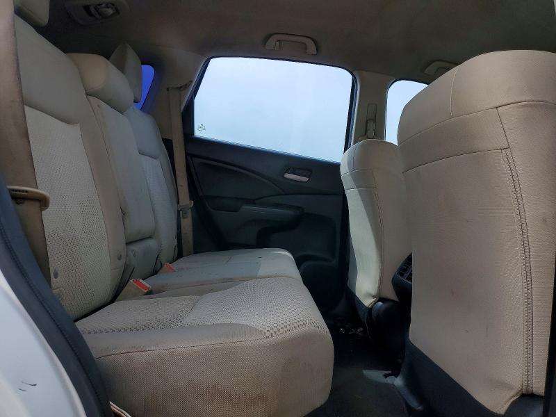 Photo 11 from auction – 2016 HONDA CR-V LX with VIN 5J6RM4H36GL139053