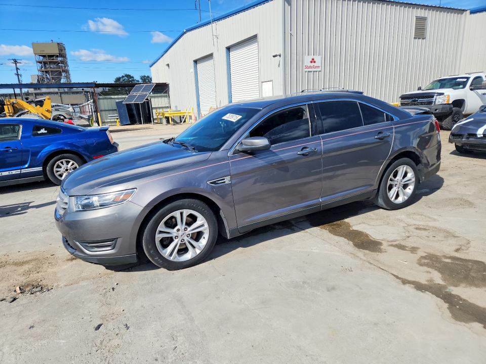 FORD TAURUS 2014 with VIN 1FAHP2E8XEG173750 - Photo from auction