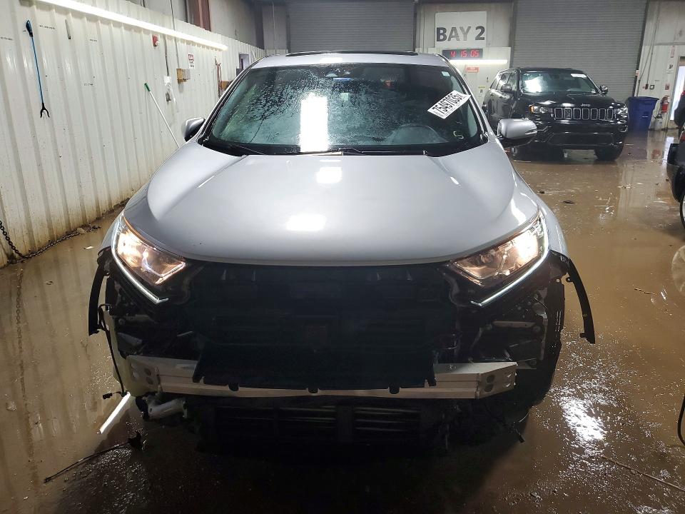 Photo 5 from auction – 2021 HONDA CR-V EX with VIN 5J6RW2H52ML010884