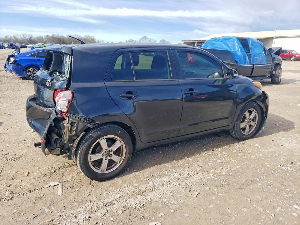 Photo 3 from auction – 2014 TOYOTA SCION XD with VIN JTKKUPB47E1040611
