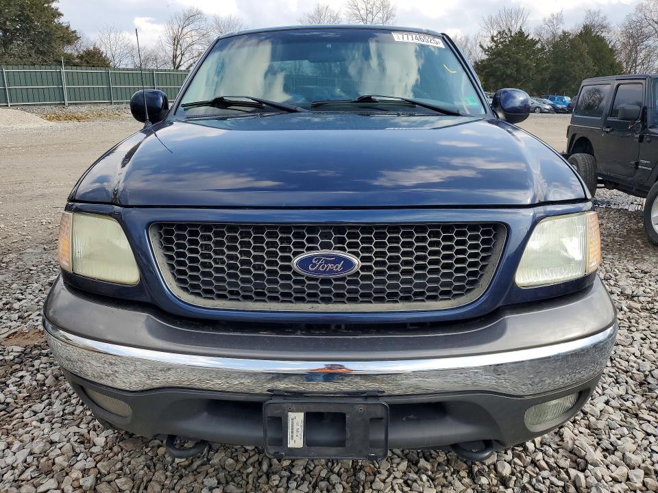 Photo 5 from auction – 2002 FORD F150 with VIN 1FTRX18LX2NB70248