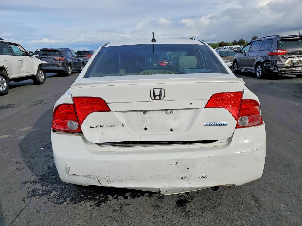 Photo 6 from auction – 2007 HONDA CIVIC HYBR with VIN JHMFA36267S025631