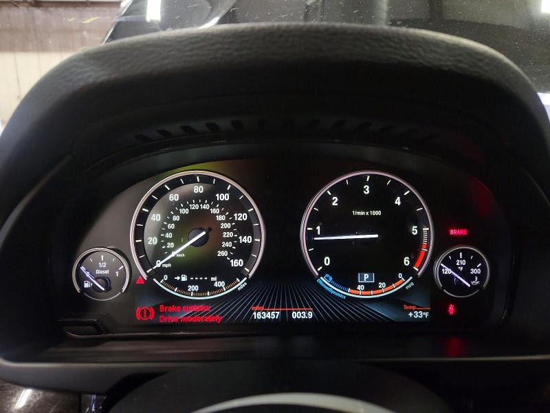 Photo 9 from auction – 2014 BMW X5 XDRIVE3 with VIN 5UXKS4C55E0J96475