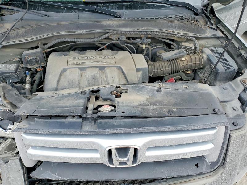 Фото 11 с аукциона – 2006 HONDA PILOT EX с VIN 5FNYF18626B029817
