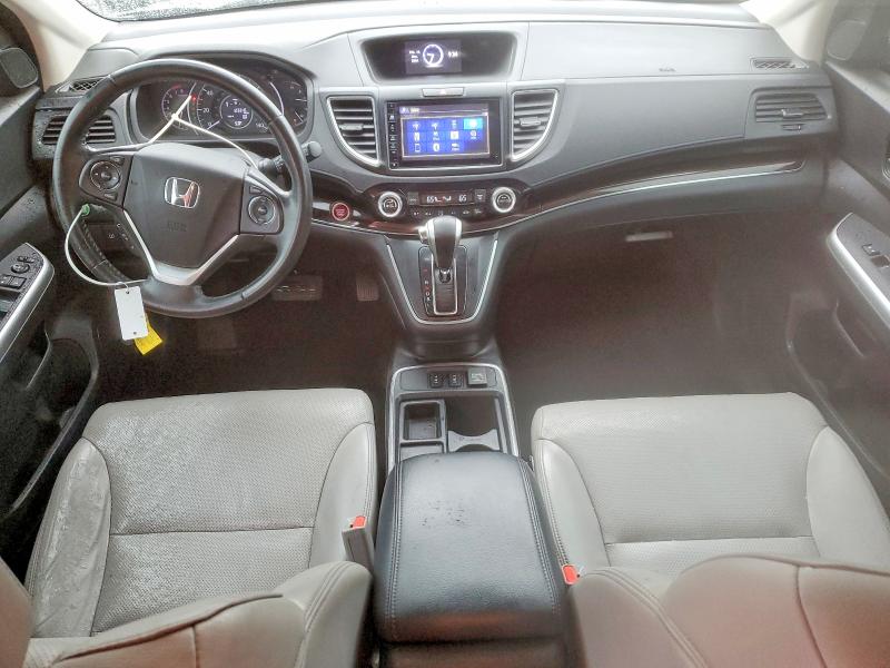 Photo 8 from auction – 2016 HONDA CR-V with VIN 2HKRM3H71GH523541