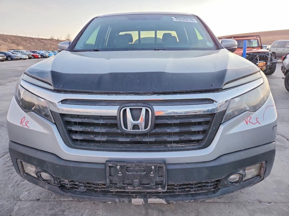 Photo 5 from auction – 2019 HONDA RIDGELINE with VIN 5FPYK3F50KB021542