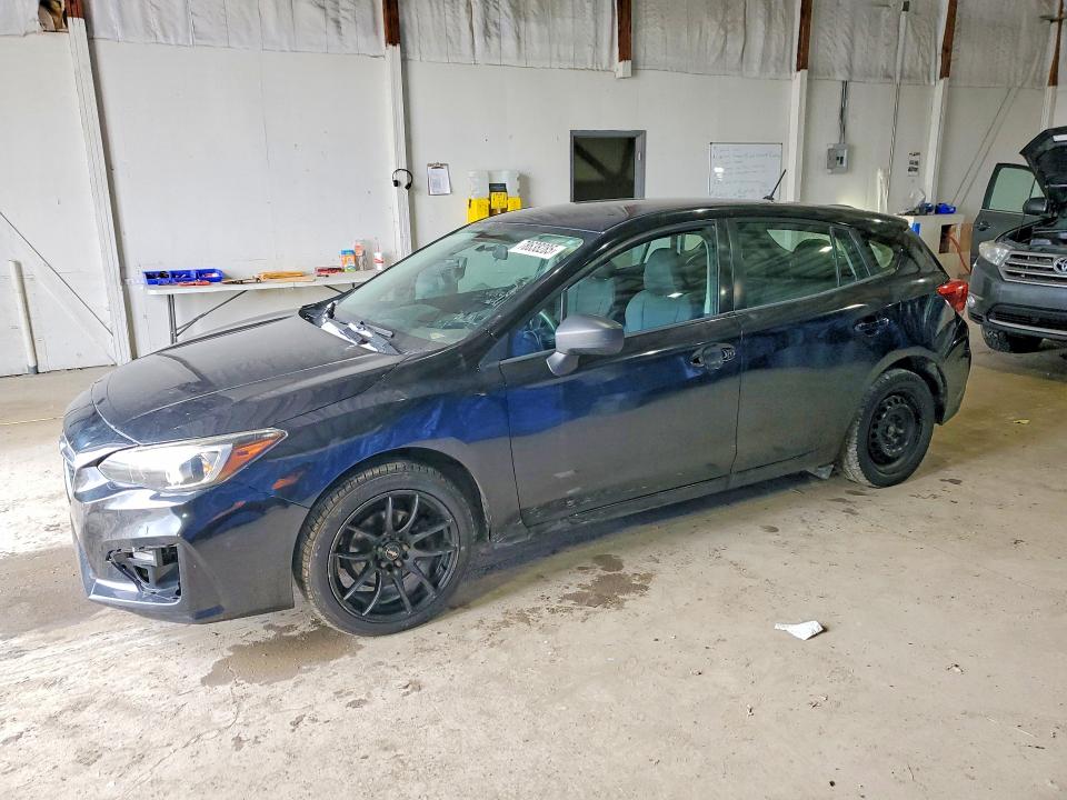 SUBARU IMPREZA 2018 with VIN 4S3GTAA63J3702716 - Photo from auction