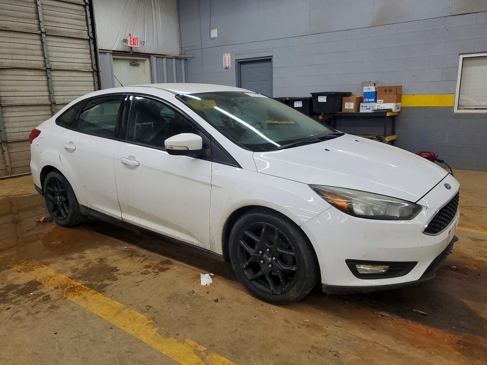 Photo 4 from auction – 2016 FORD FOCUS with VIN 1FADP3F21GL309563