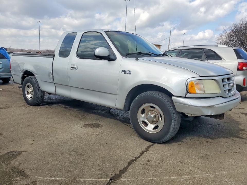 Photo 4 from auction – 2003 FORD F150 with VIN 2FTRX17213CA07858