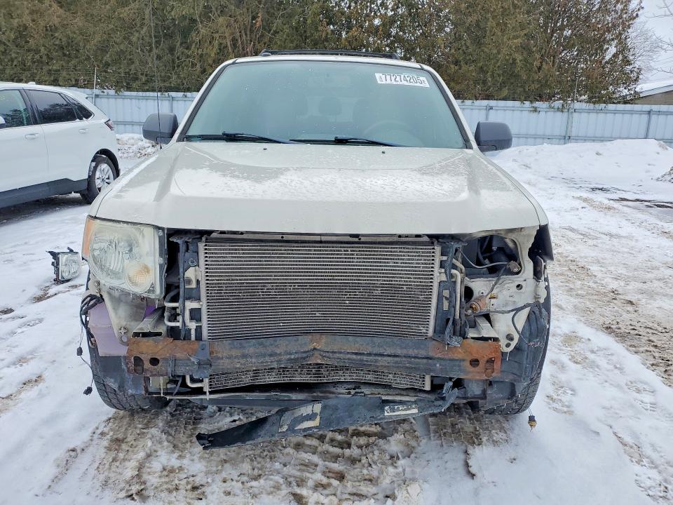 Photo 5 from auction – 2011 FORD ESCAPE with VIN 1FMCU0D75BKA77619