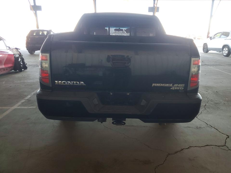 Photo 6 from auction – 2012 HONDA RIDGELINE with VIN 5FPYK1F51CB452705