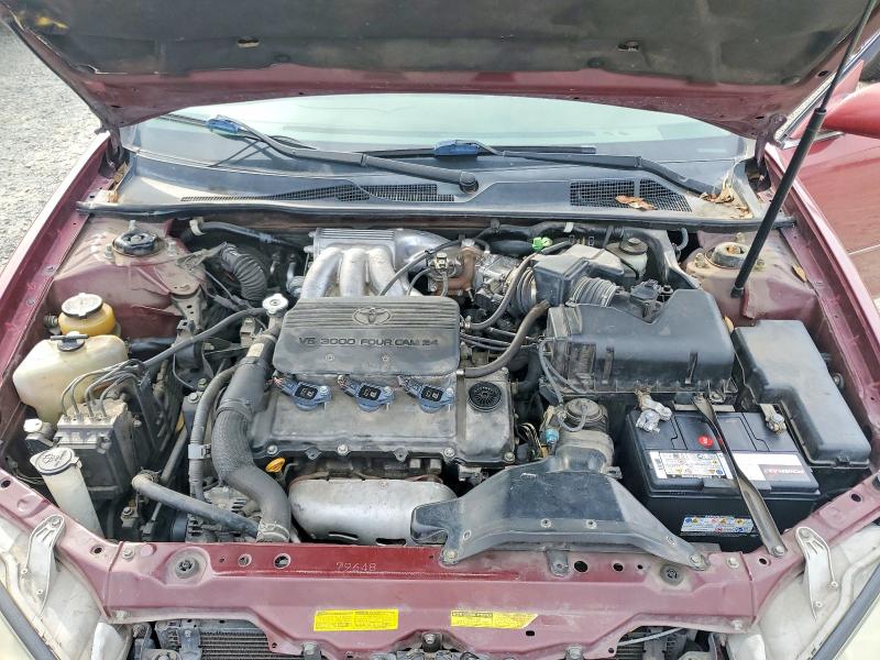 Photo 11 from auction – 2002 TOYOTA CAMRY with VIN JTDBF30K320074168