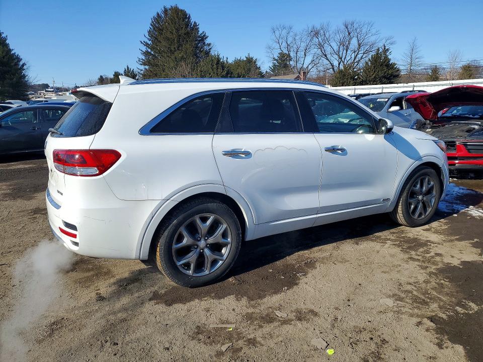 Photo 3 from auction – 2016 KIA SORENTO SX with VIN 5XYPKDA56GG156249