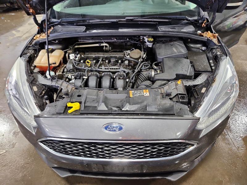 Photo 11 from auction – 2015 FORD FOCUS SE with VIN 1FADP3F29FL363787