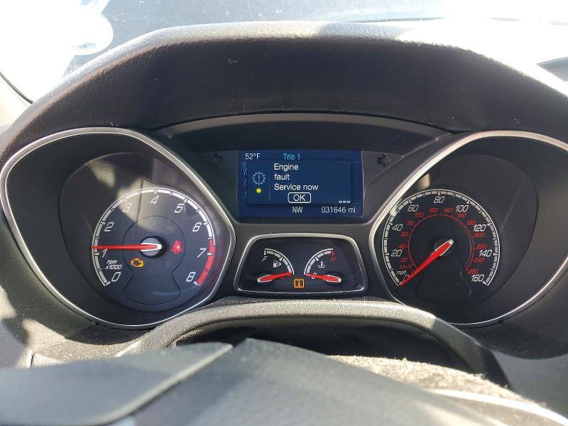 Photo 9 from auction – 2014 FORD FOCUS with VIN 1FADP3L92EL411422