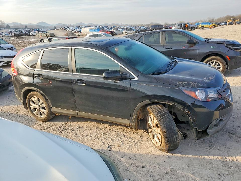 Photo 4 from auction – 2013 HONDA CR-V EX with VIN 2HKRM3H53DH517122