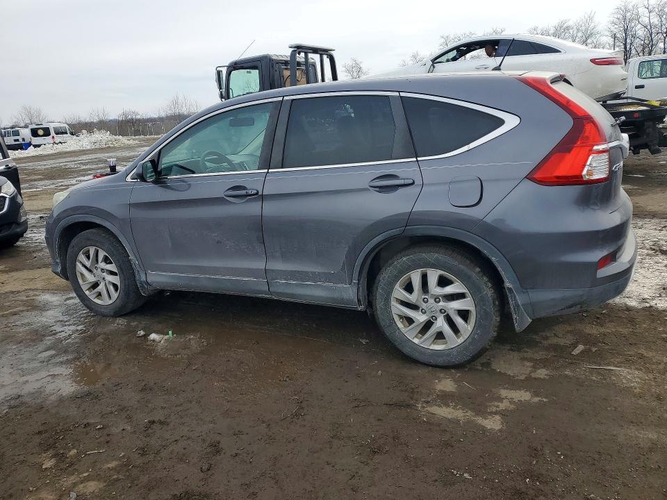 Photo 2 from auction – 2015 HONDA CR-V with VIN 2HKRM3H57FH506918