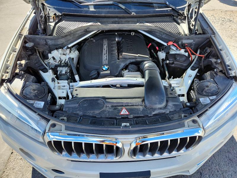 Photo 12 from auction – 2014 BMW X5 with VIN 5UXKR2C5XE0C01057