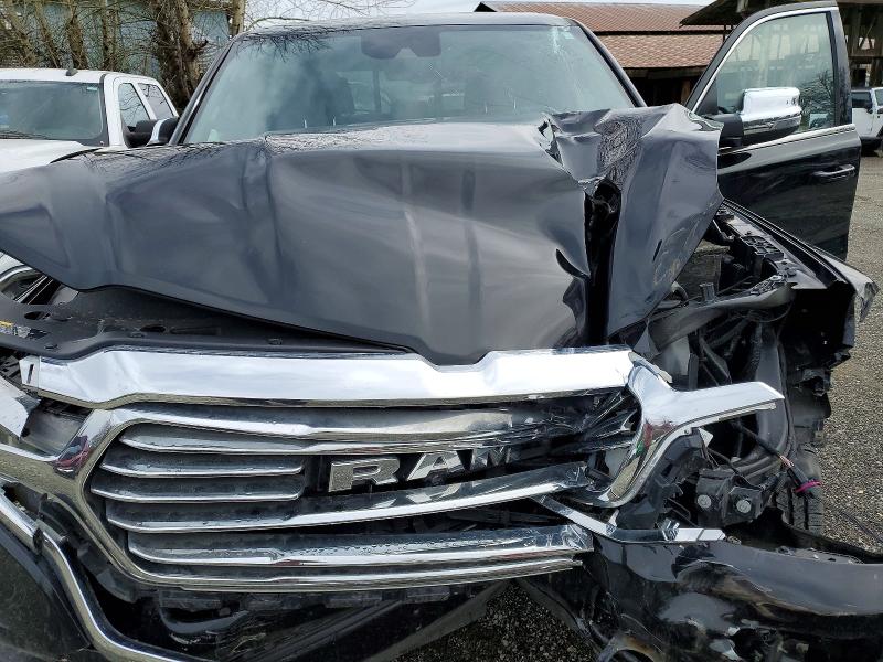Photo 11 from auction – 2023 RAM 1500 with VIN 1C6SRFKT4PN699534