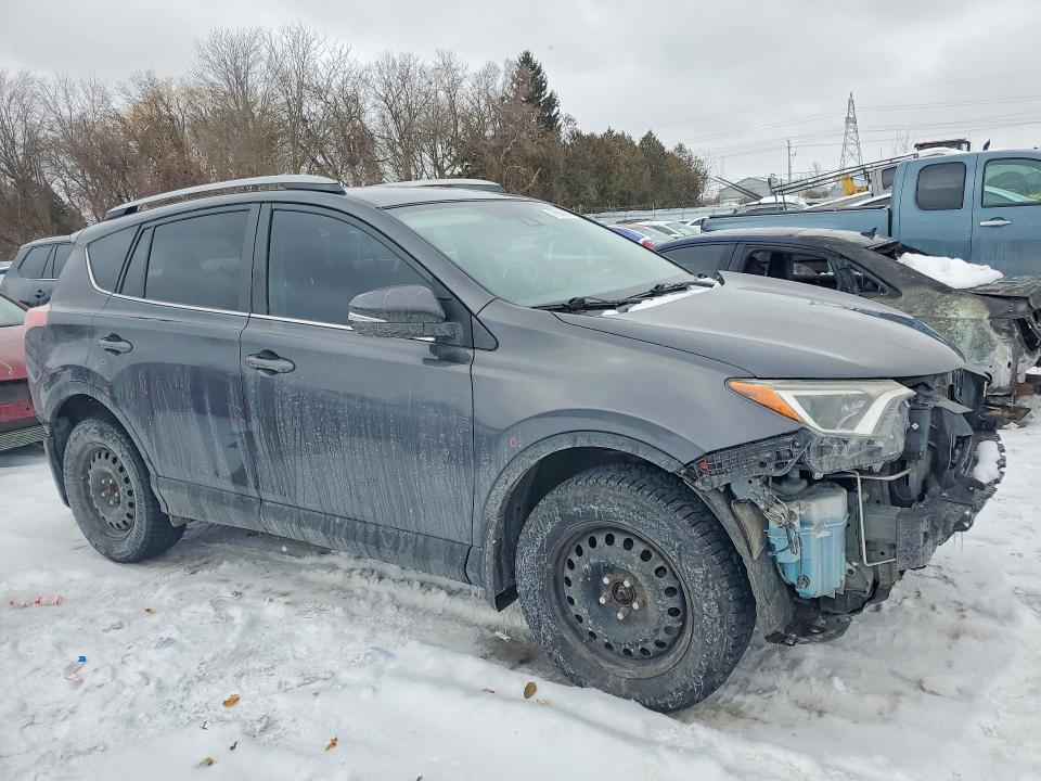 Photo 4 from auction – 2018 TOYOTA RAV4 LE with VIN 2T3ZFREV7JW499696
