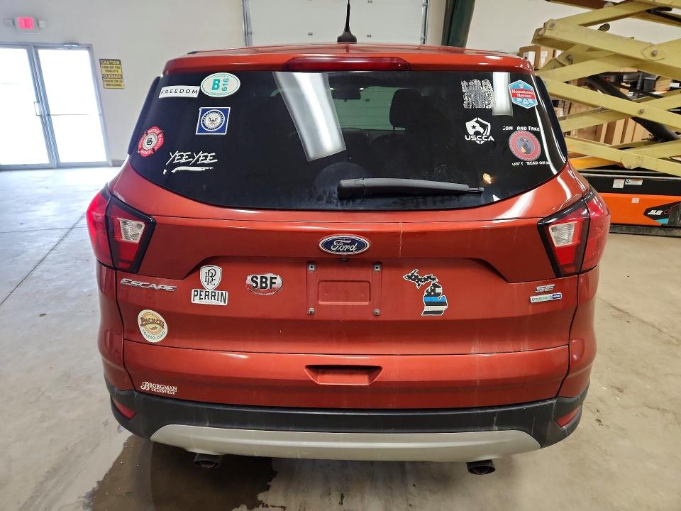 Photo 6 from auction – 2019 FORD ESCAPE with VIN 1FMCU9GD8KUB56261