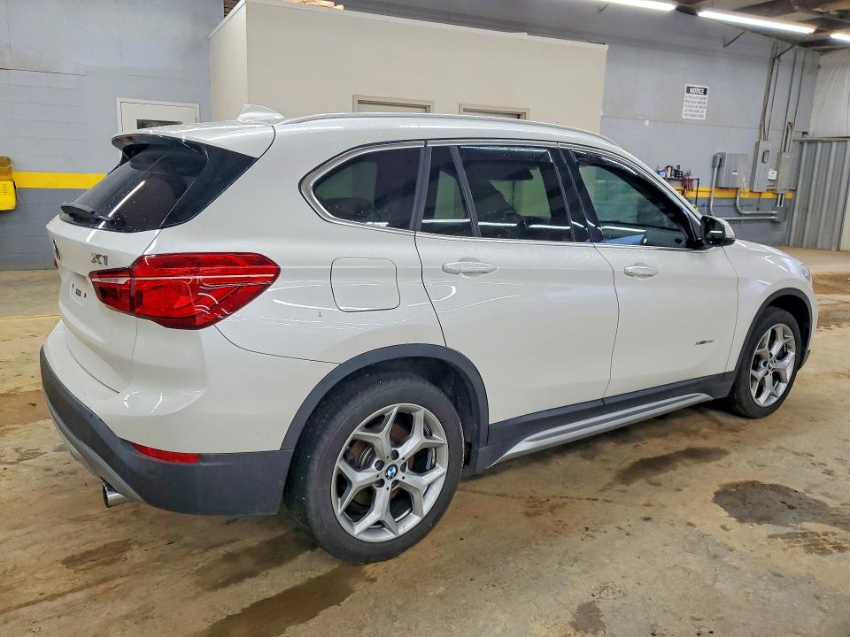 Photo 3 from auction – 2016 BMW X1 XDRIVE2 with VIN WBXHT3C32G5E53296