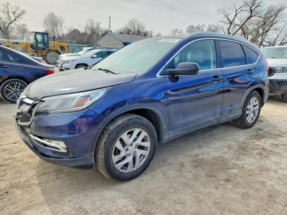 HONDA CR-V 2015 with VIN 2HKRM3H72FH517696 - Photo from auction
