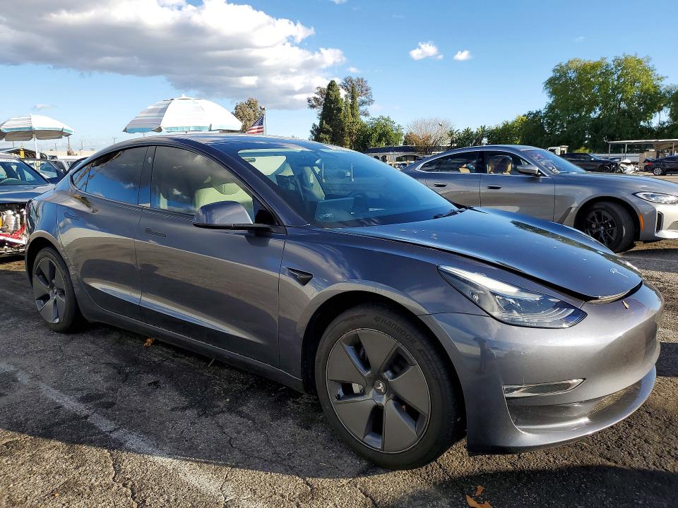 Photo 4 from auction – 2023 TESLA MODEL 3 with VIN 5YJ3E1EAXPF647118