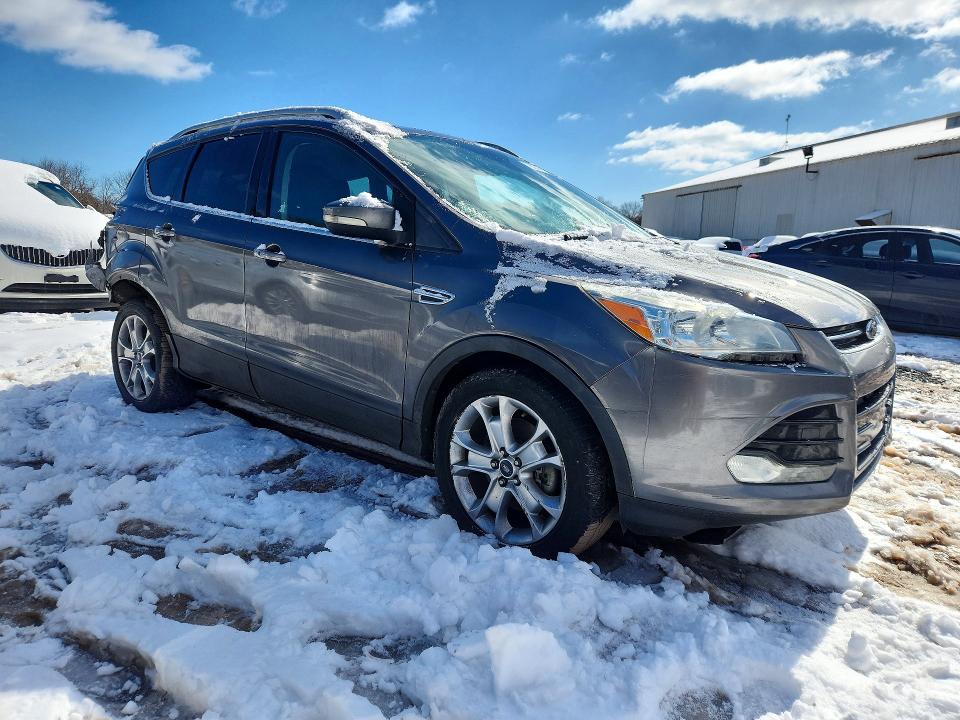Photo 4 from auction – 2014 FORD ESCAPE with VIN 1FMCU0J97EUB17505