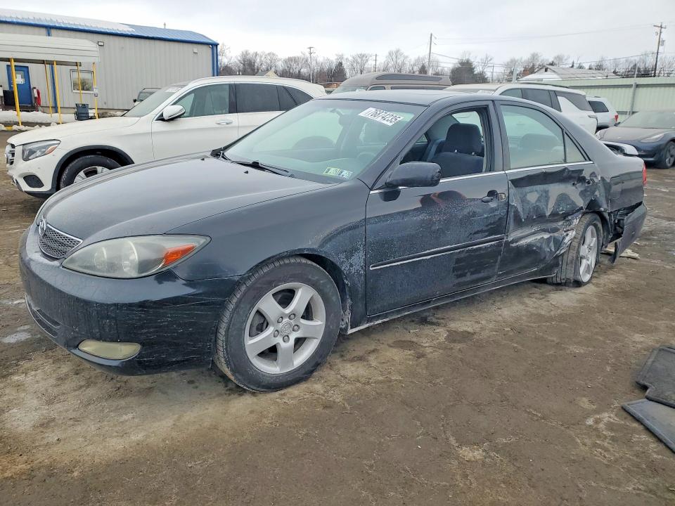 TOYOTA CAMRY 2002 with VIN 4T1BF32K42U021044 - Photo from auction