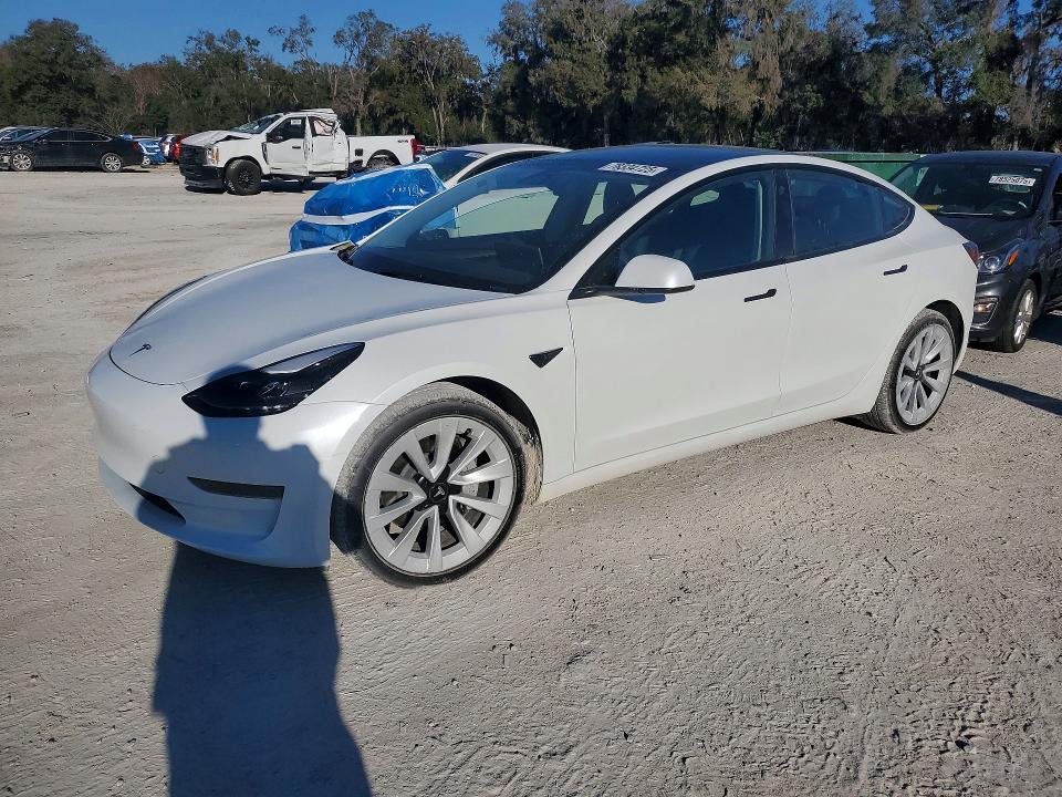 TESLA MODEL 3 2023 with VIN 5YJ3E1EA2PF562841 - Photo from auction
