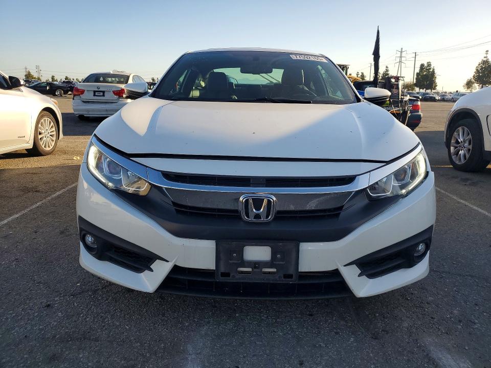 Photo 5 from auction – 2016 HONDA CIVIC with VIN 2HGFC3B75GH359879