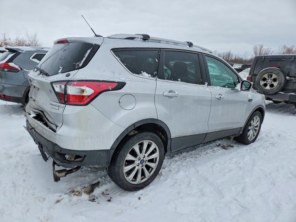 Photo 3 from auction – 2017 FORD ESCAPE TIT with VIN 1FMCU0JD3HUE69778
