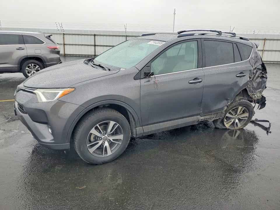 TOYOTA RAV4 2018 with VIN 2T3WFREV0JW506250 - Photo from auction