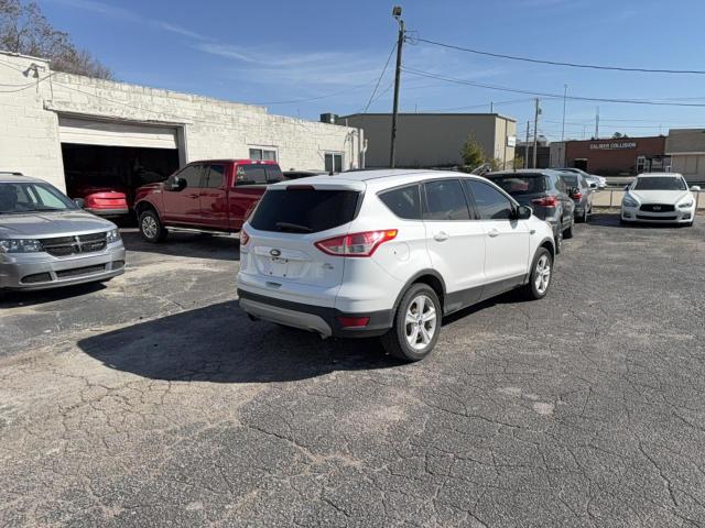 Photo 4 from auction – 2014 FORD ESCAPE with VIN 1FMCU9GXXEUB16889