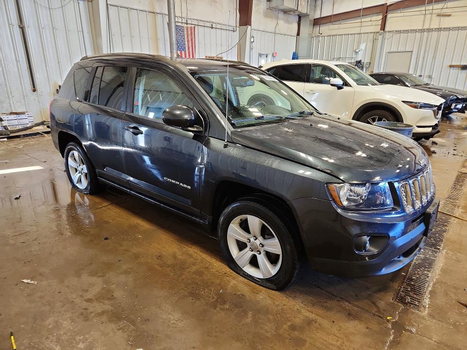 Photo 4 from auction – 2014 JEEP COMPASS LA with VIN 1C4NJDEB4ED897957