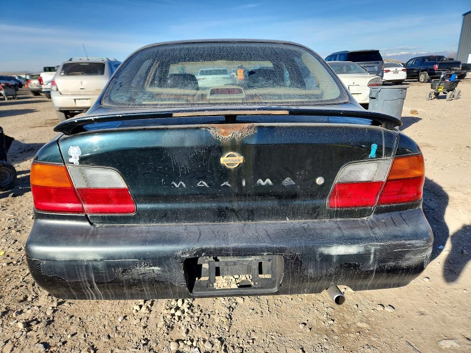 Photo 6 from auction – 1995 NISSAN MAXIMA GLE with VIN JN1CA21D4ST005469