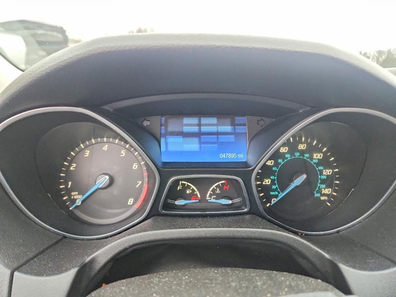 Photo 9 from auction – 2014 FORD FOCUS with VIN 1FADP3F25EL104695