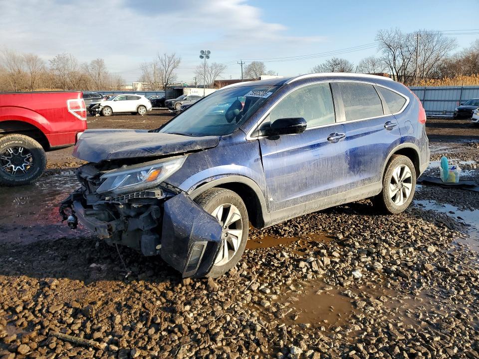 HONDA CR-V TOURI 2016 with VIN 5J6RM4H92GL016841 - Photo from auction