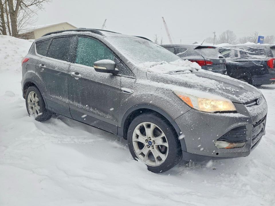 Photo 4 from auction – 2013 FORD ESCAPE with VIN 1FMCU0H93DUD50799