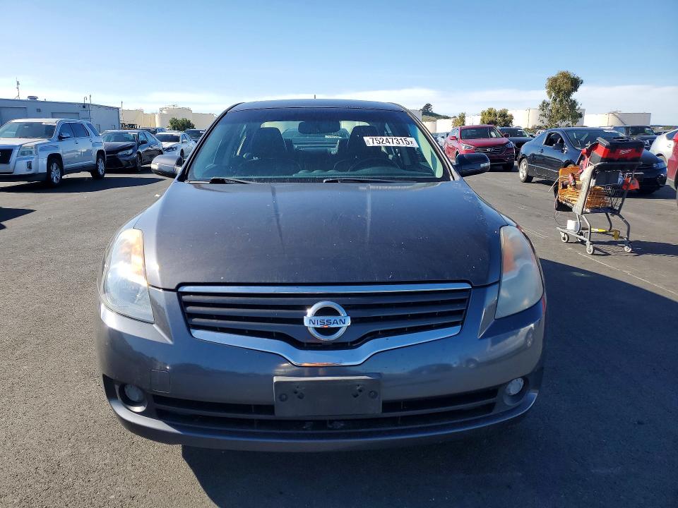 Photo 5 from auction – 2009 NISSAN ALTIMA HYBRID with VIN 1N4CL21E09C192368