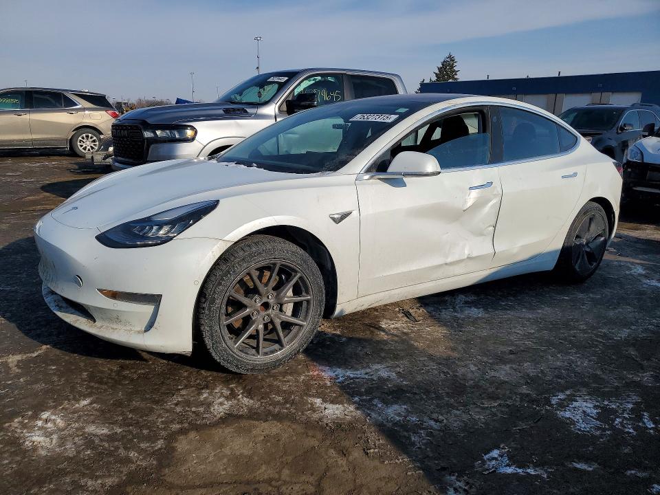 TESLA MODEL 3 2018 with VIN 5YJ3E1EA3JF052182 - Photo from auction