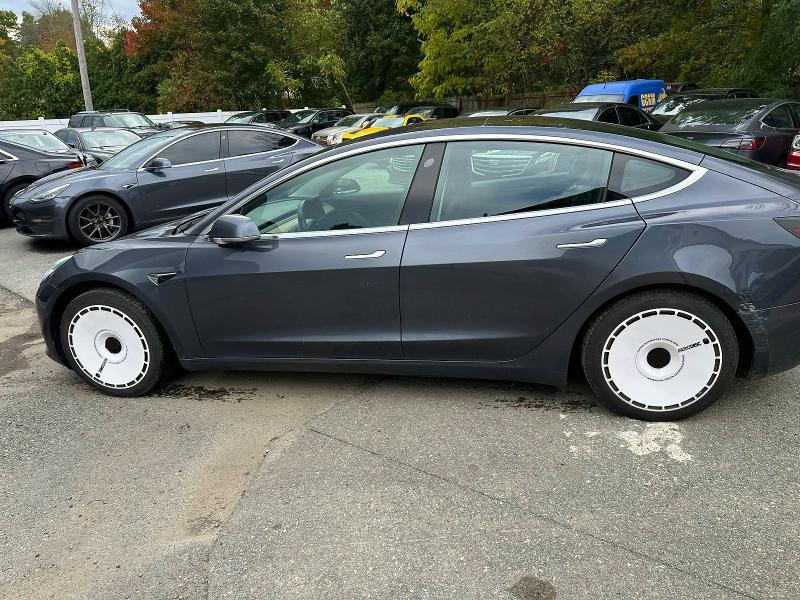 Photo 11 from auction – 2018 TESLA MODEL 3 with VIN 5YJ3E1EB1JF119421