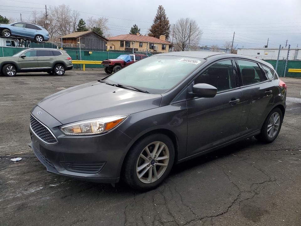 FORD FOCUS SE 2018 with VIN 1FADP3K28JL250962 - Photo from auction