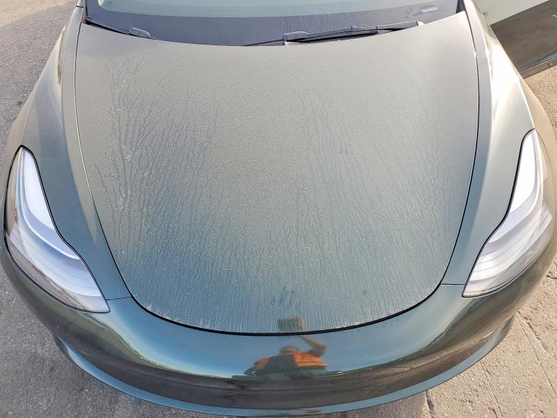 Photo 12 from auction – 2023 TESLA MODEL 3 with VIN 5YJ3E1EA9PF614790