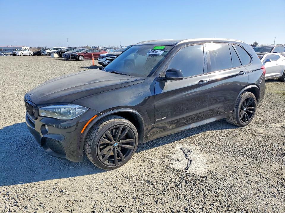BMW X5 XDRIVE5 2014 with VIN 5UXKR6C57E0J72587 - Photo from auction