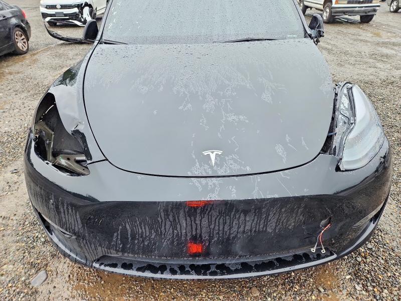 Photo 11 from auction – 2023 TESLA MODEL Y with VIN 7SAYGDEF6PF921107