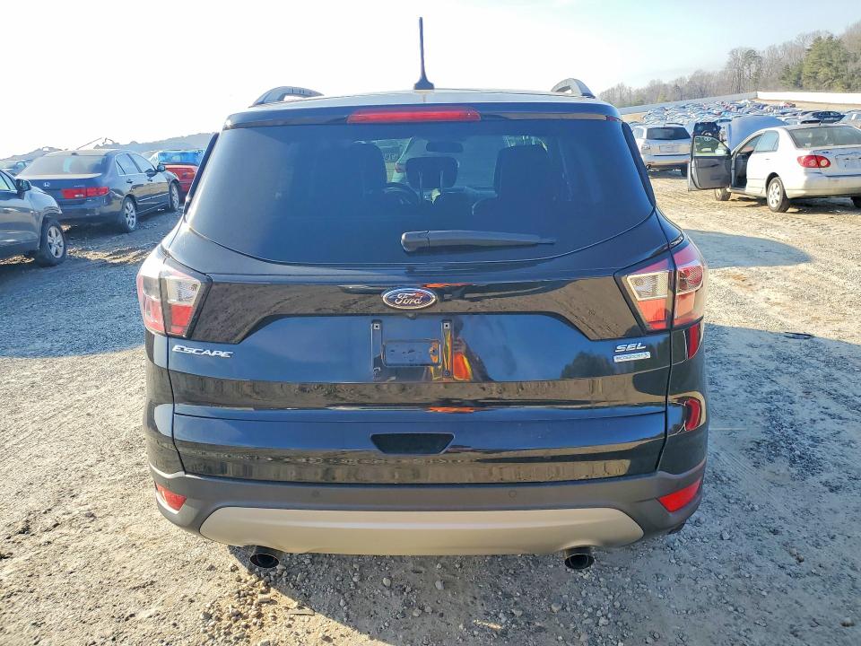 Photo 6 from auction – 2018 FORD ESCAPE with VIN 1FMCU0HD5JUA03362