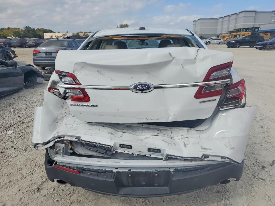 Photo 6 from auction – 2018 FORD TAURUS SE with VIN 1FAHP2D84JG104659