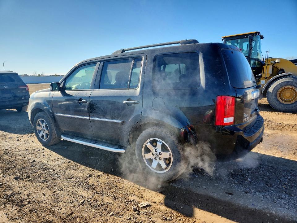 Photo 2 from auction – 2010 HONDA PILOT TOUR with VIN 5FNYF4H91AB011359